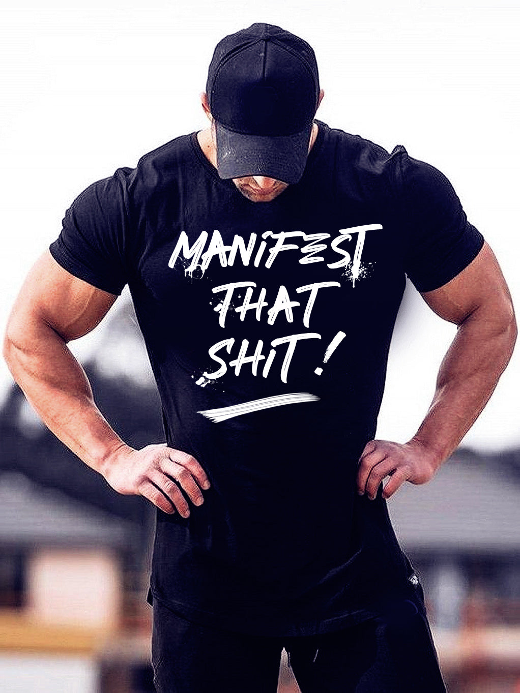 Man wearing Manifest That Sh*t black streetwear T-shirt